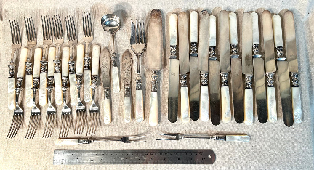 Landers, Frary & Clark 31 pc Sterling with MOP Handles